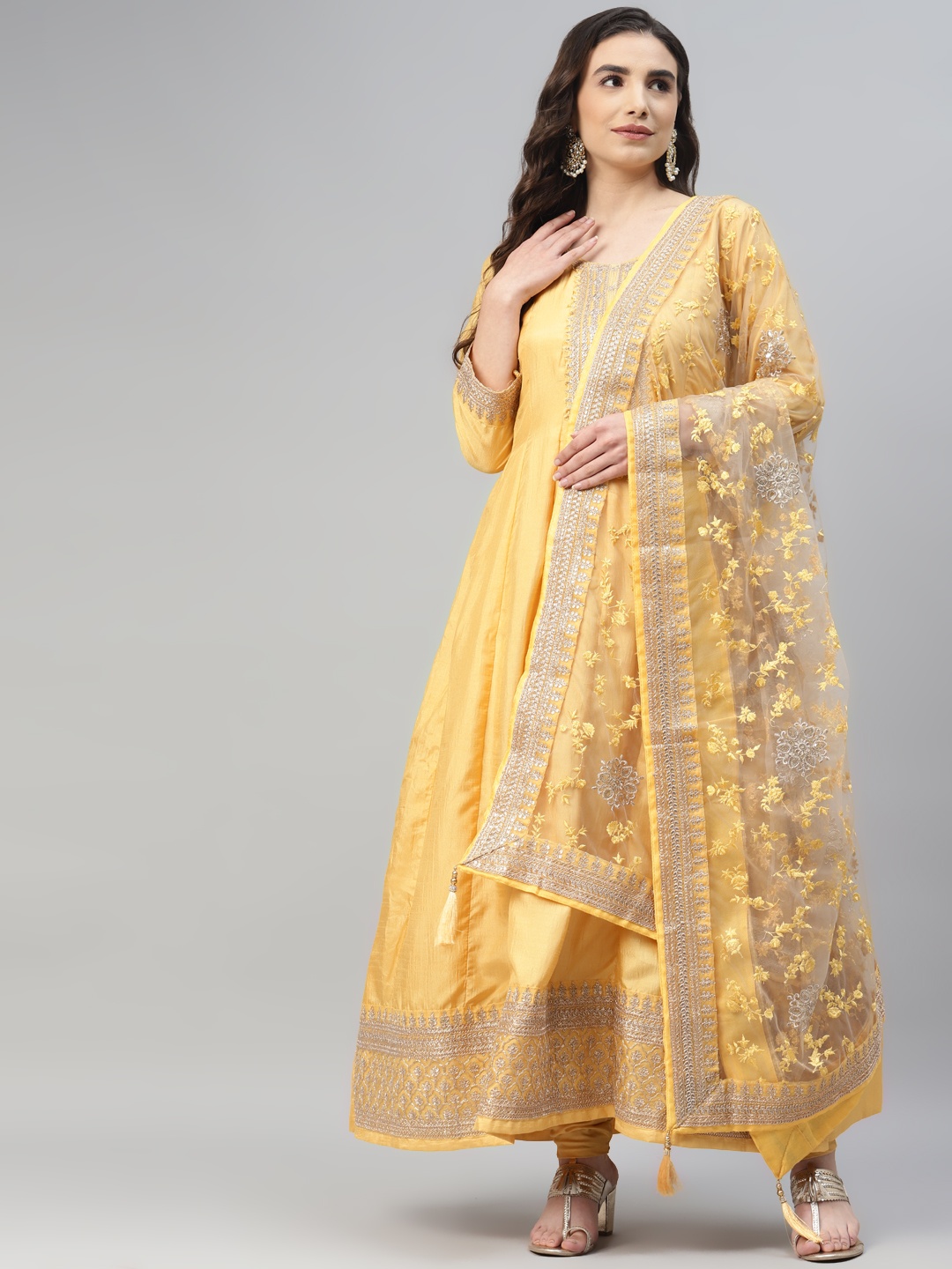 

Readiprint Fashions Mustard Yellow Embroidered Art Silk Semi-Stitched Dress Material