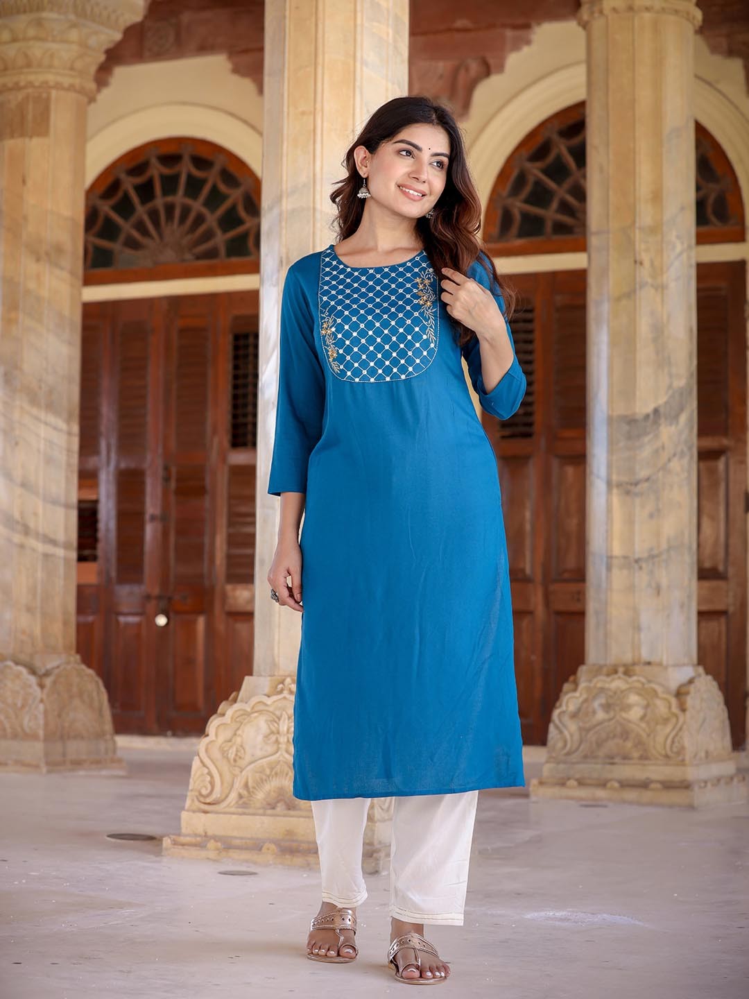 

Yufta Women Teal Yoke Design Mirror Work Kurta