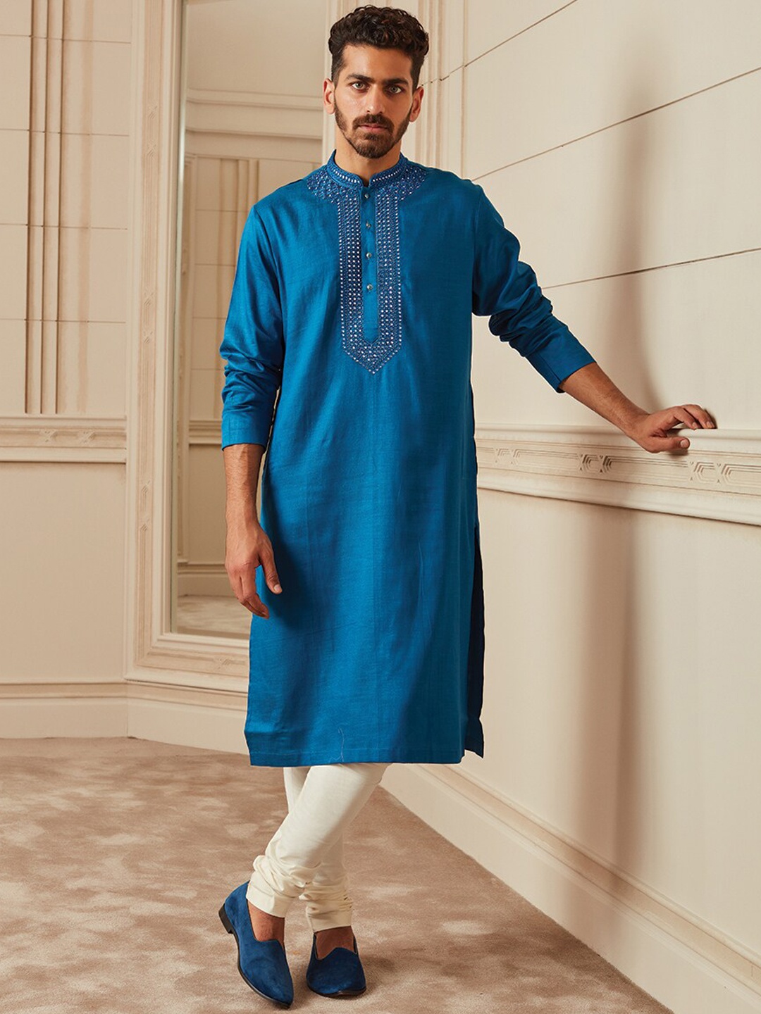 

Tasva Men Blue Yoke Design Mirror Work Kurta with Churidar