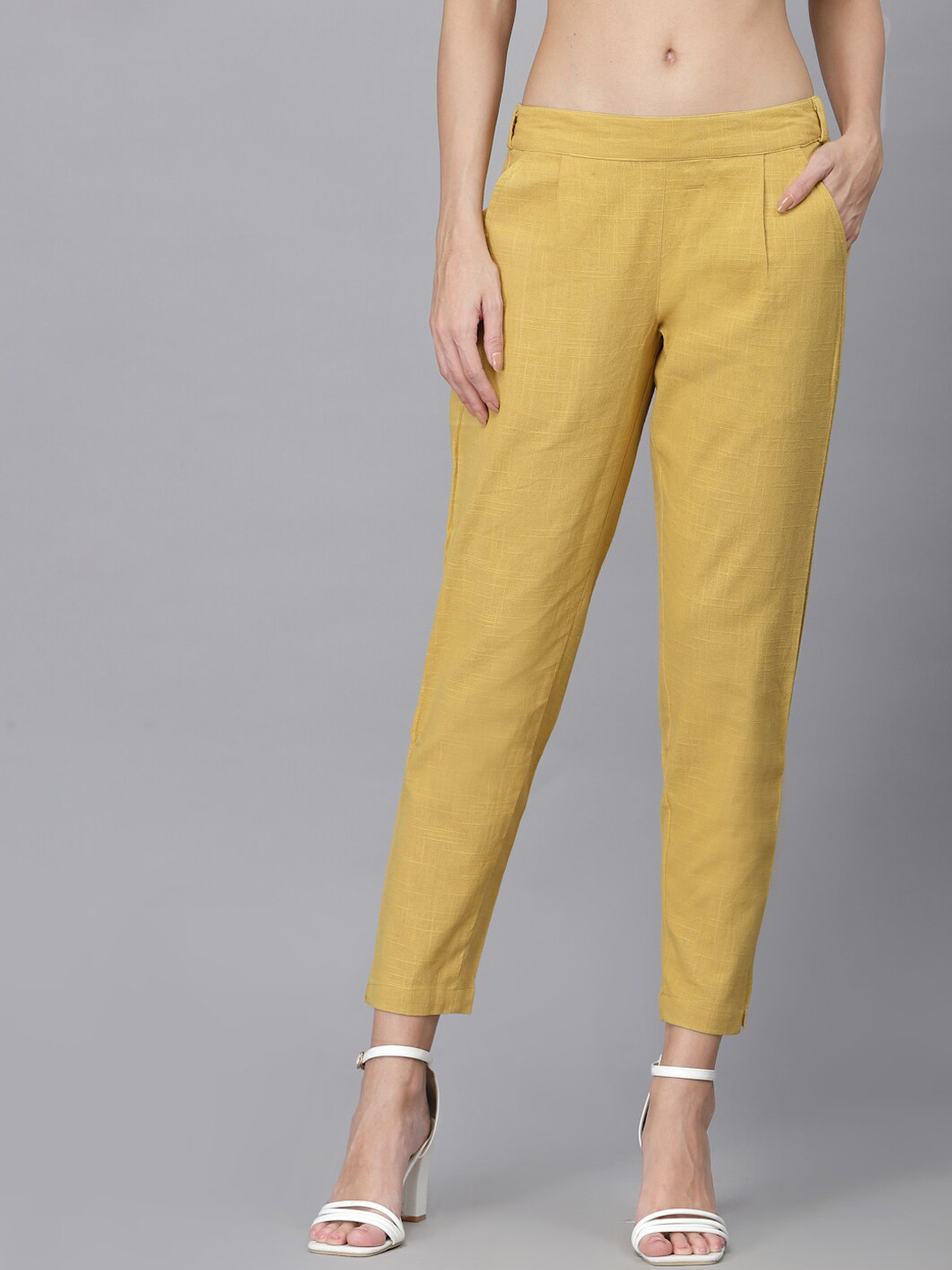 

Ragavi Women Tapered Fit Pleated Cotton Cropped Cigarette Trousers, Mustard