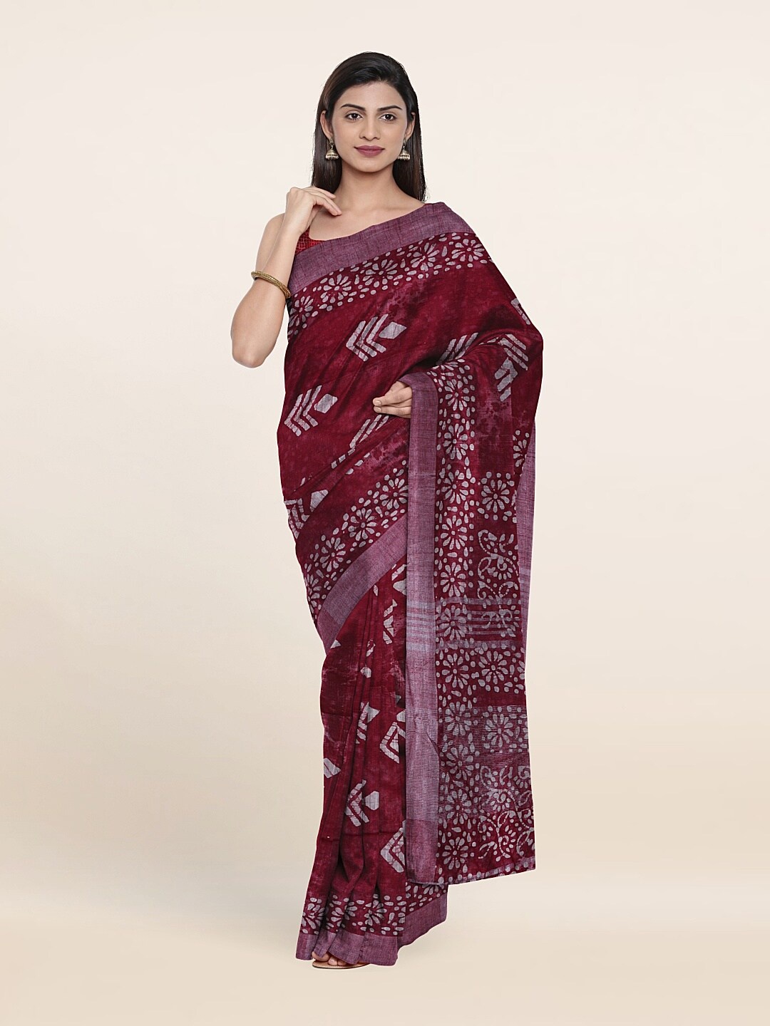 

Pothys Maroon & White Batik Zari Linen Blend Saree