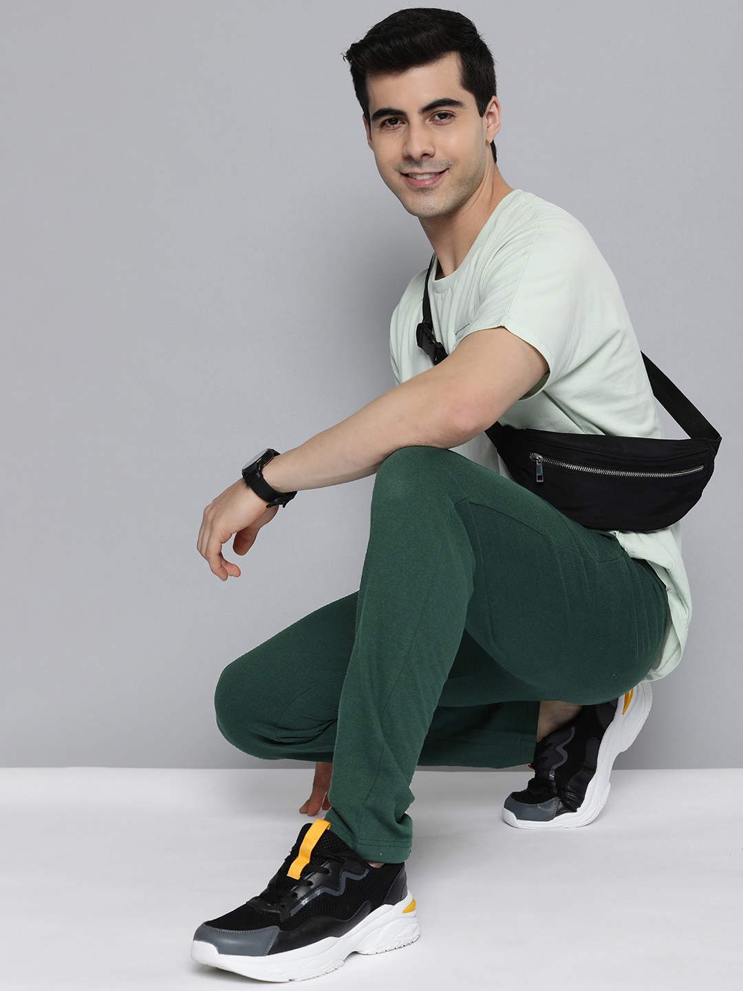 

HERE&NOW Men Green Solid Knitted Track Pants