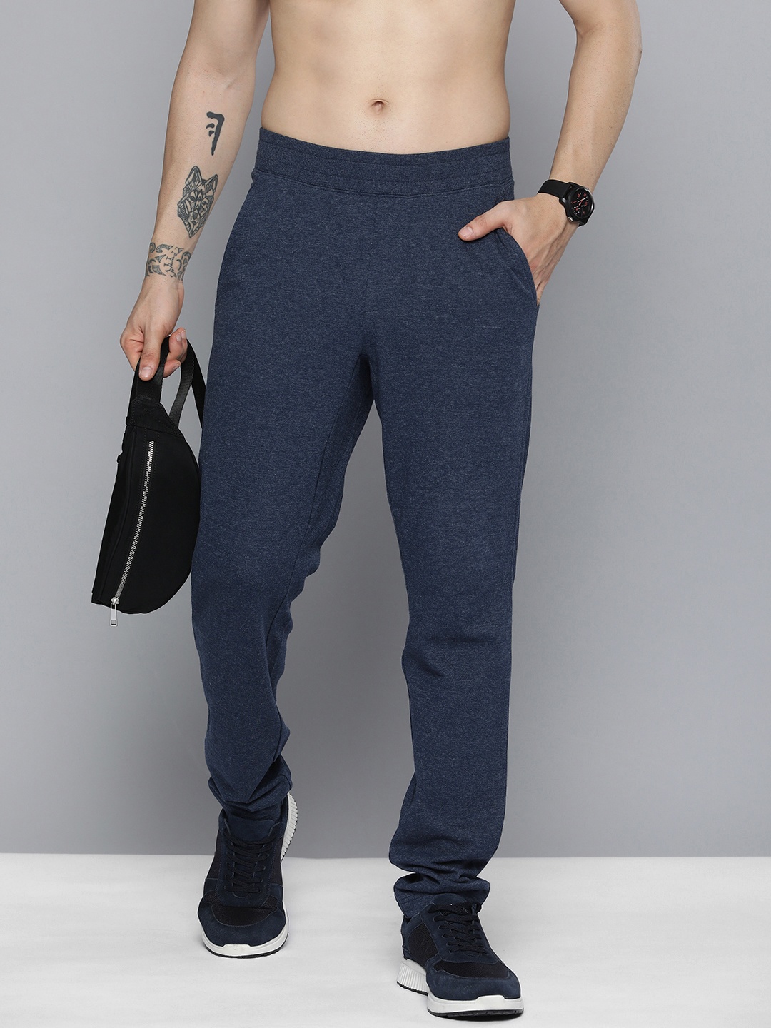

HERE&NOW Men Navy Blue Solid Knitted Track Pants
