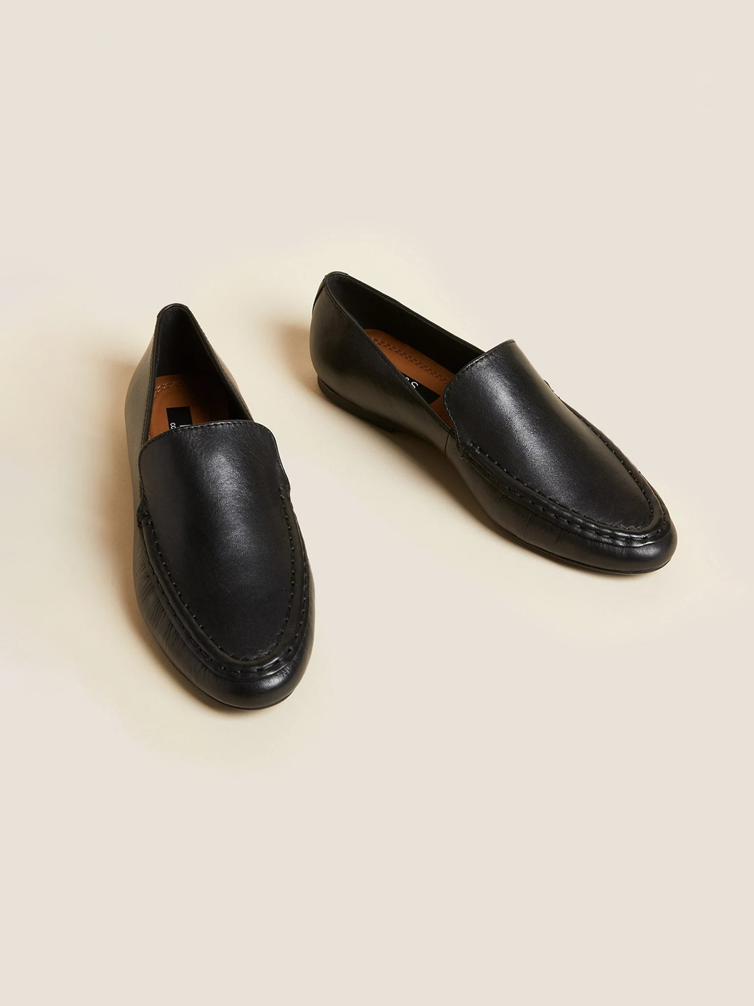 

Marks & Spencer Women Black Solid Leather Lightweight Casual Loafers