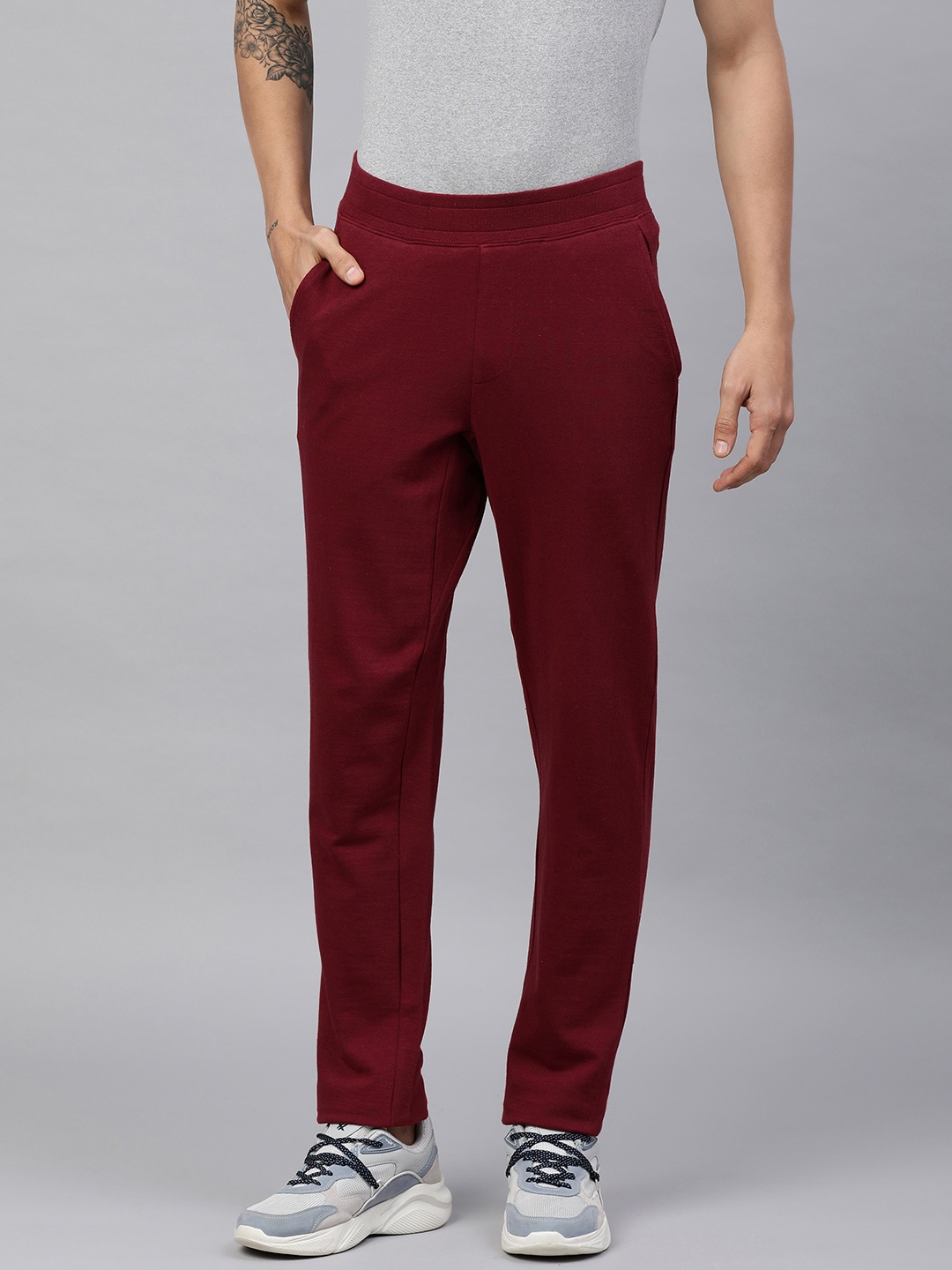 

Huetrap Men Solid Joggers, Red