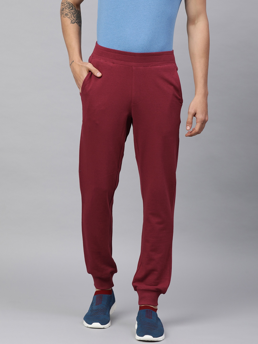 

Huetrap Men Solid Joggers, Red