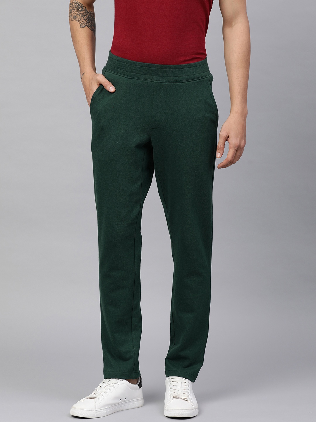 

Huetrap Men Solid Track Pants, Green