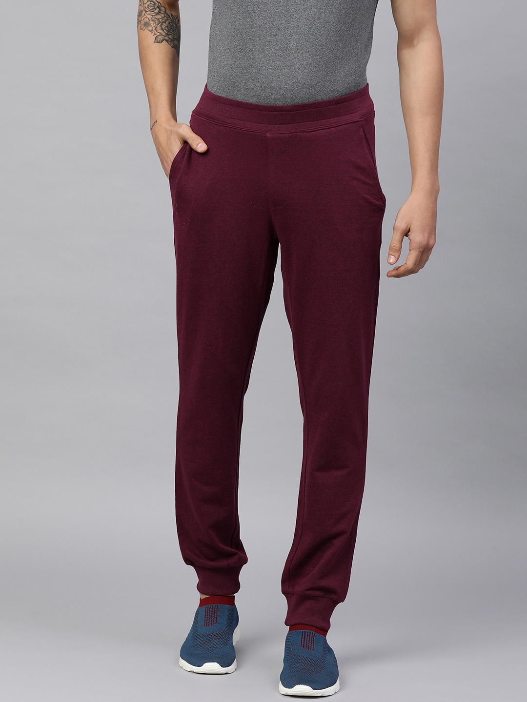 

Huetrap Men Solid Joggers, Red