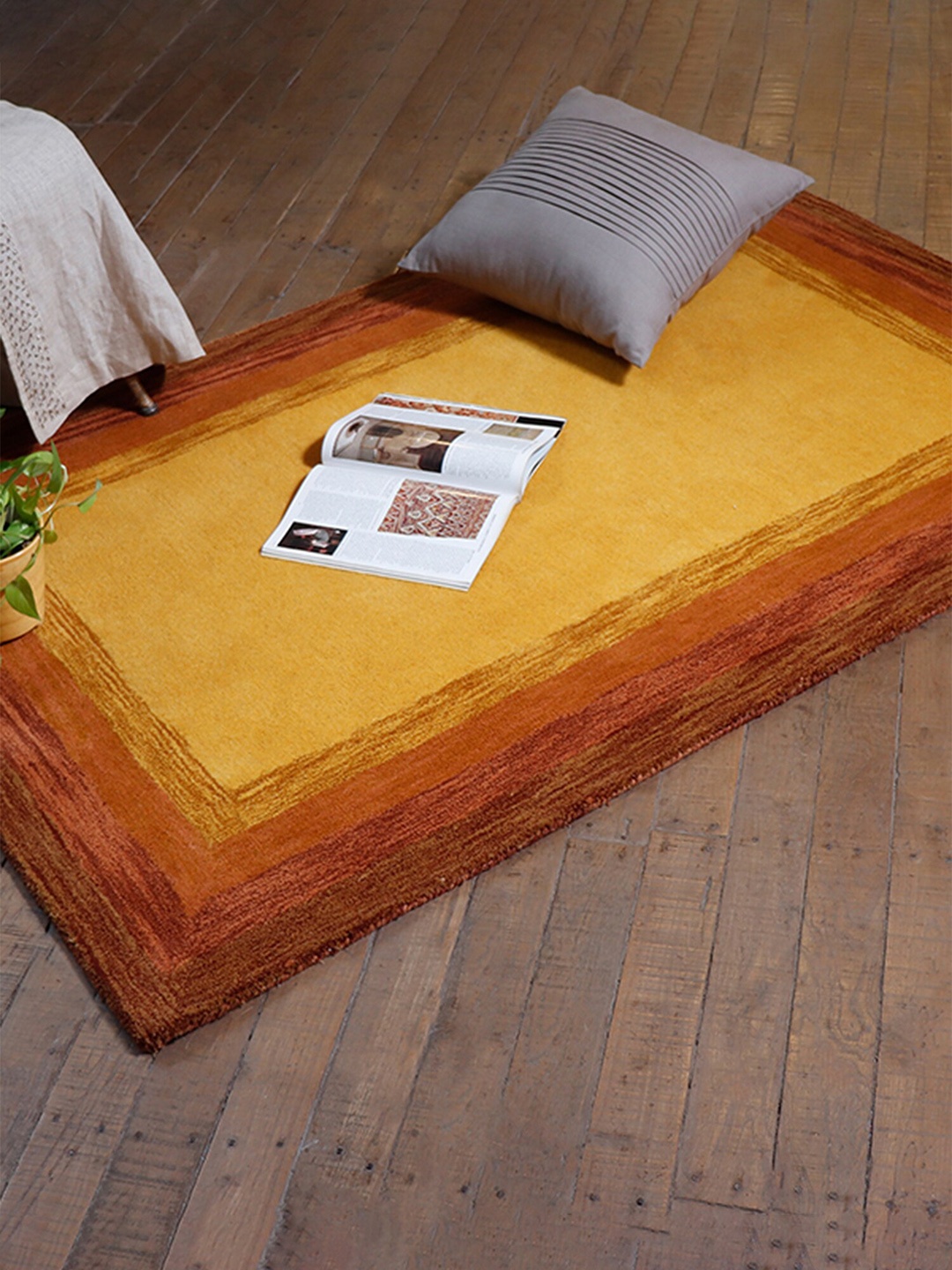 

ZEBA Solid Rectangular Shape Woolen Hand-Tufted Carpet, Brown