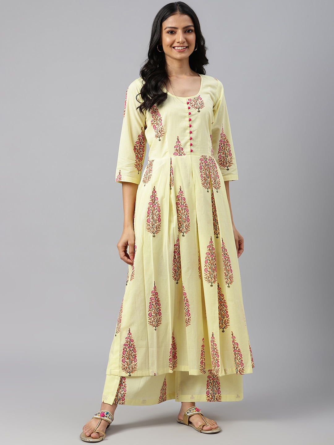 

SHRINKHLA Women Yellow Floral Printed Pleated Pure Cotton Kurta with Palazzo