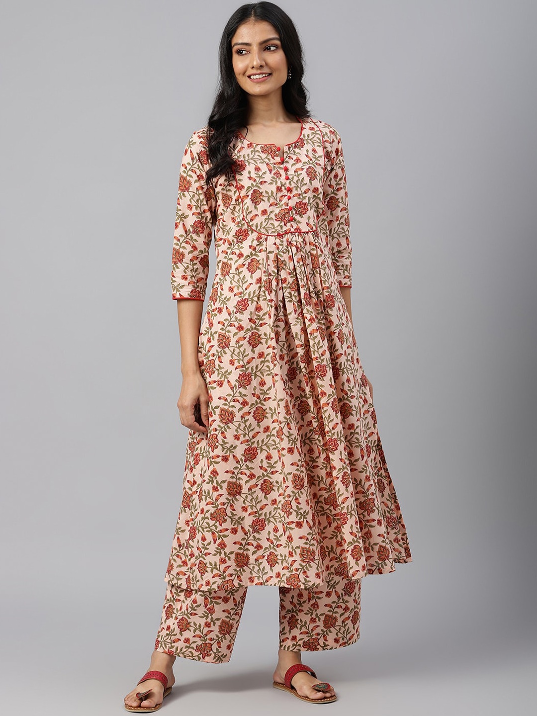 

SHRINKHLA Women Peach Floral Printed Round Neck Pure Cotton Kurta with Palazzos