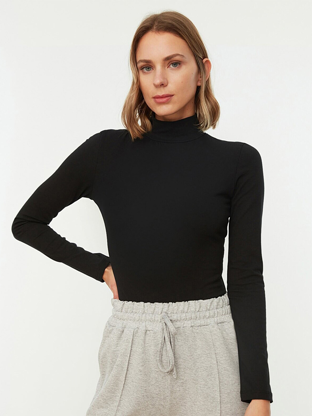 

Trendyol Women Solid High Neck Pure Cotton Fitted Top, Black