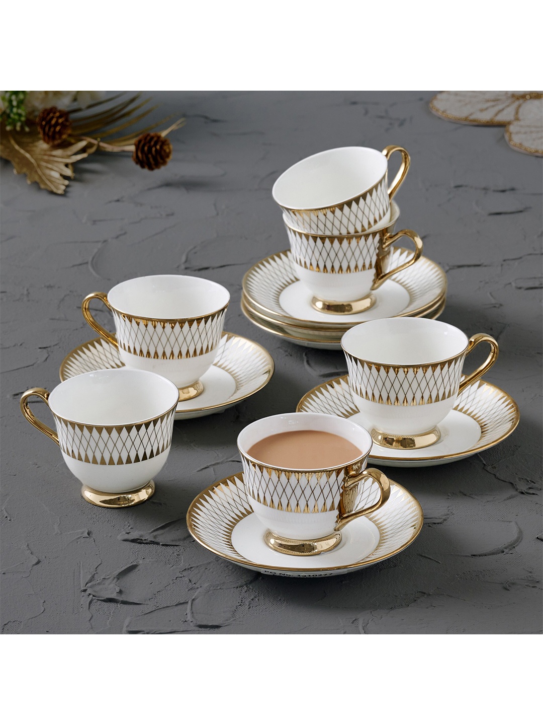 

Home Centre 12 Pcs Printed Bone China Glossy Cups and Saucers, Off white