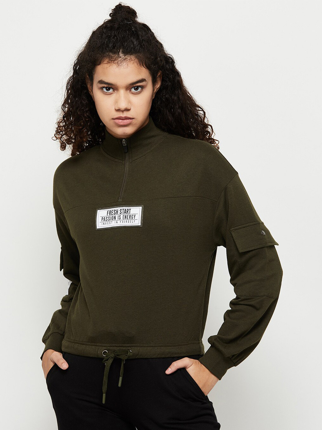 

max Women Green Solid Sweatshirt