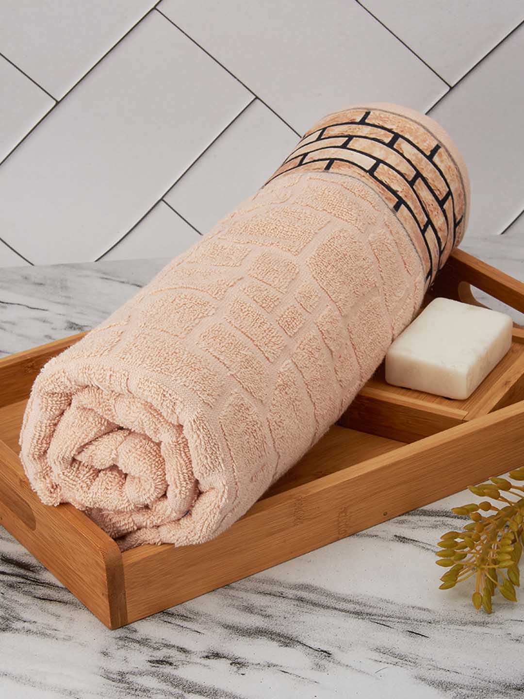 

Black gold Set of 4 Self Design 650 GSM Pure Cotton Bath Towels, Beige