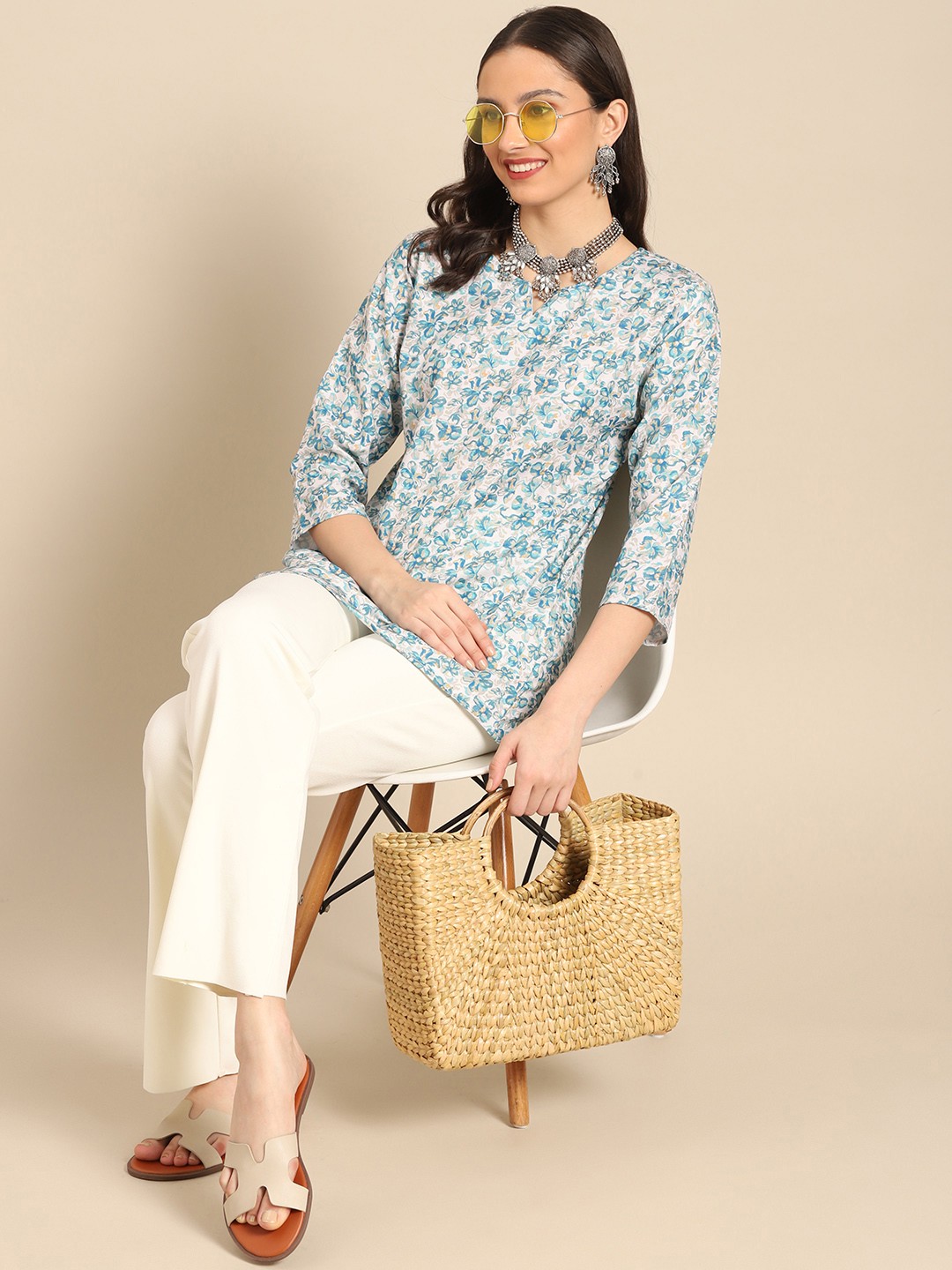 

Sangria White & Blue Floral Printed Kurti