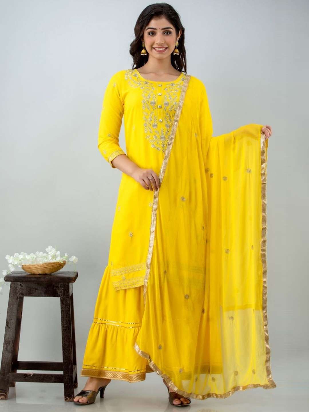 

Lovista Women Yellow Kurta with Sharara & With Dupatta