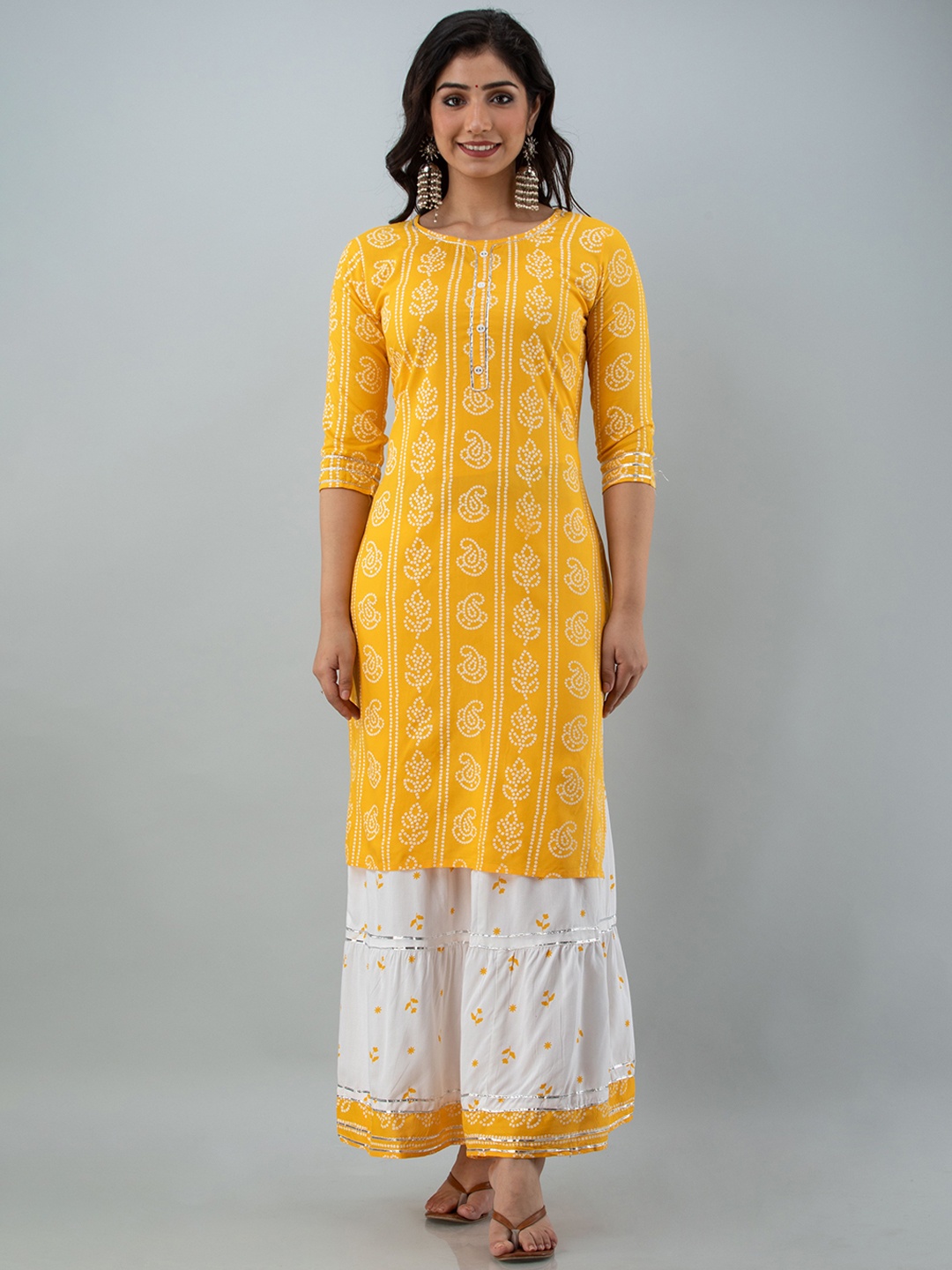 

Lovista Women Yellow Bandhani Printed Kurta with Skirt