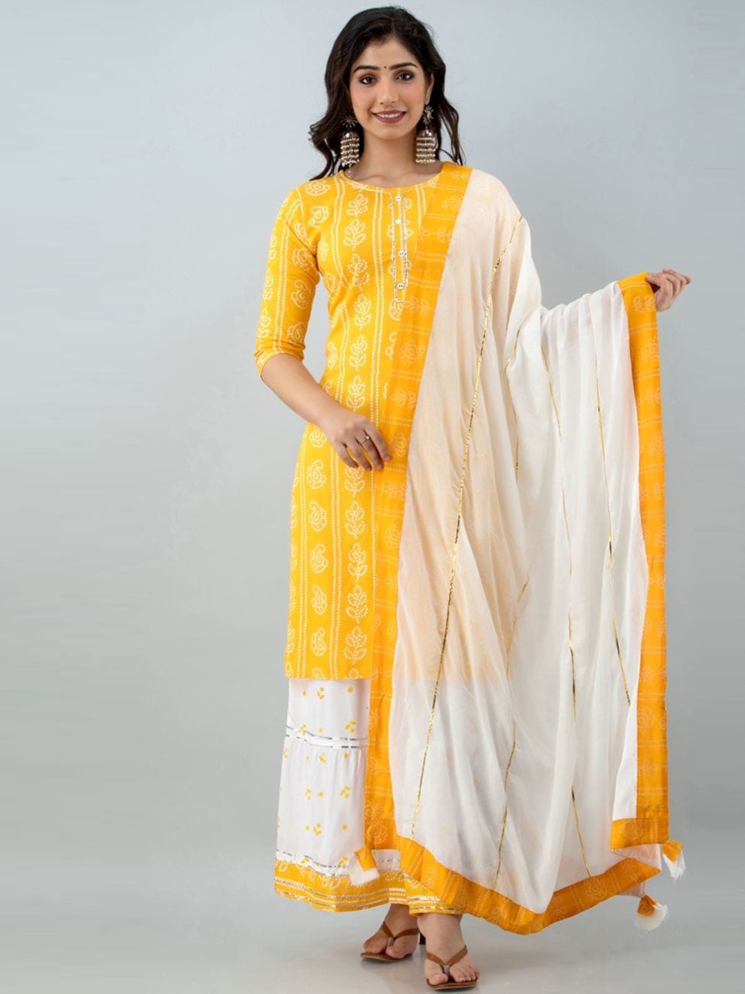 

Lovista Women Yellow Bandhani Printed Kurta with Skirt & With Dupatta