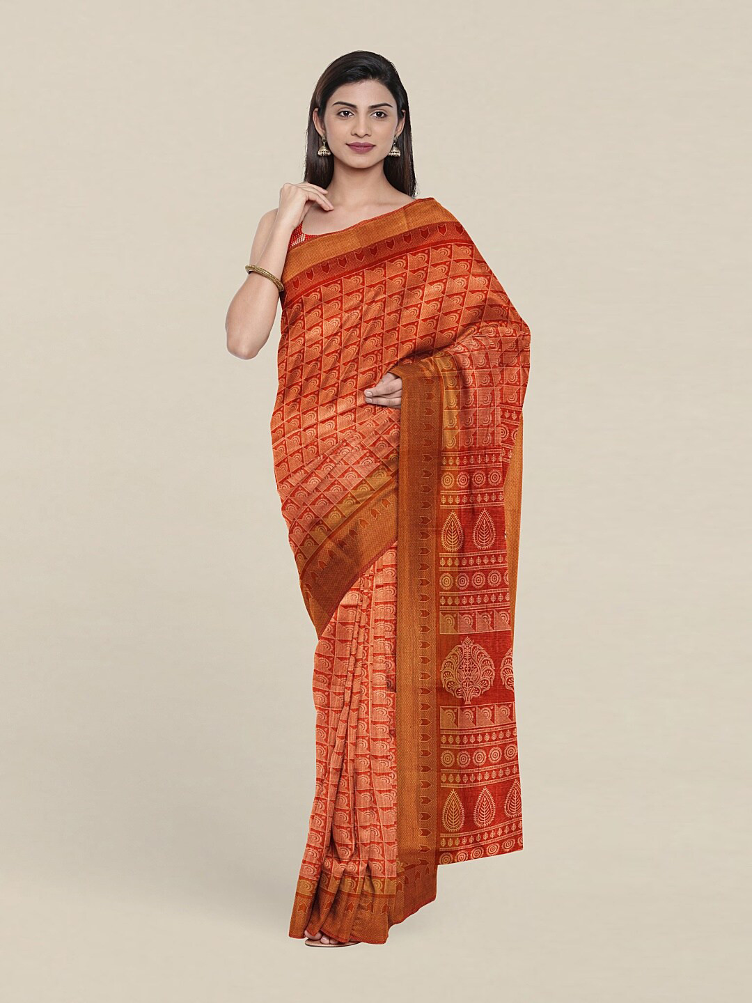 

Pothys Rust Ethnic Motifs Saree