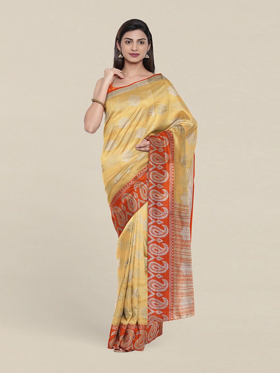 

Pothys Cream & Orange Woven Design Zari Cotton Blend Saree