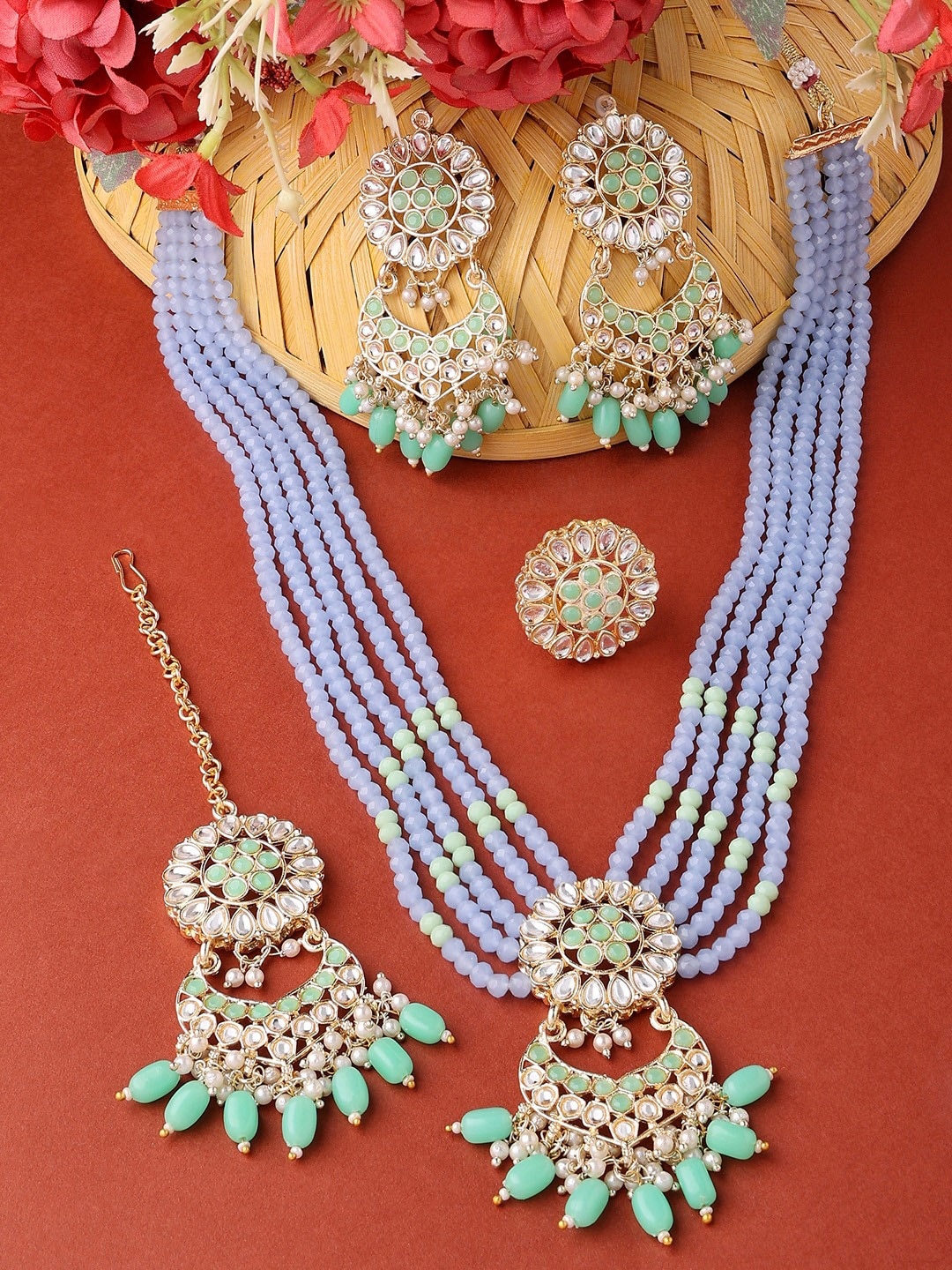 

Zaveri Pearls Gold-Plated Stone-Studded & Pearl Beaded Jewellery Set