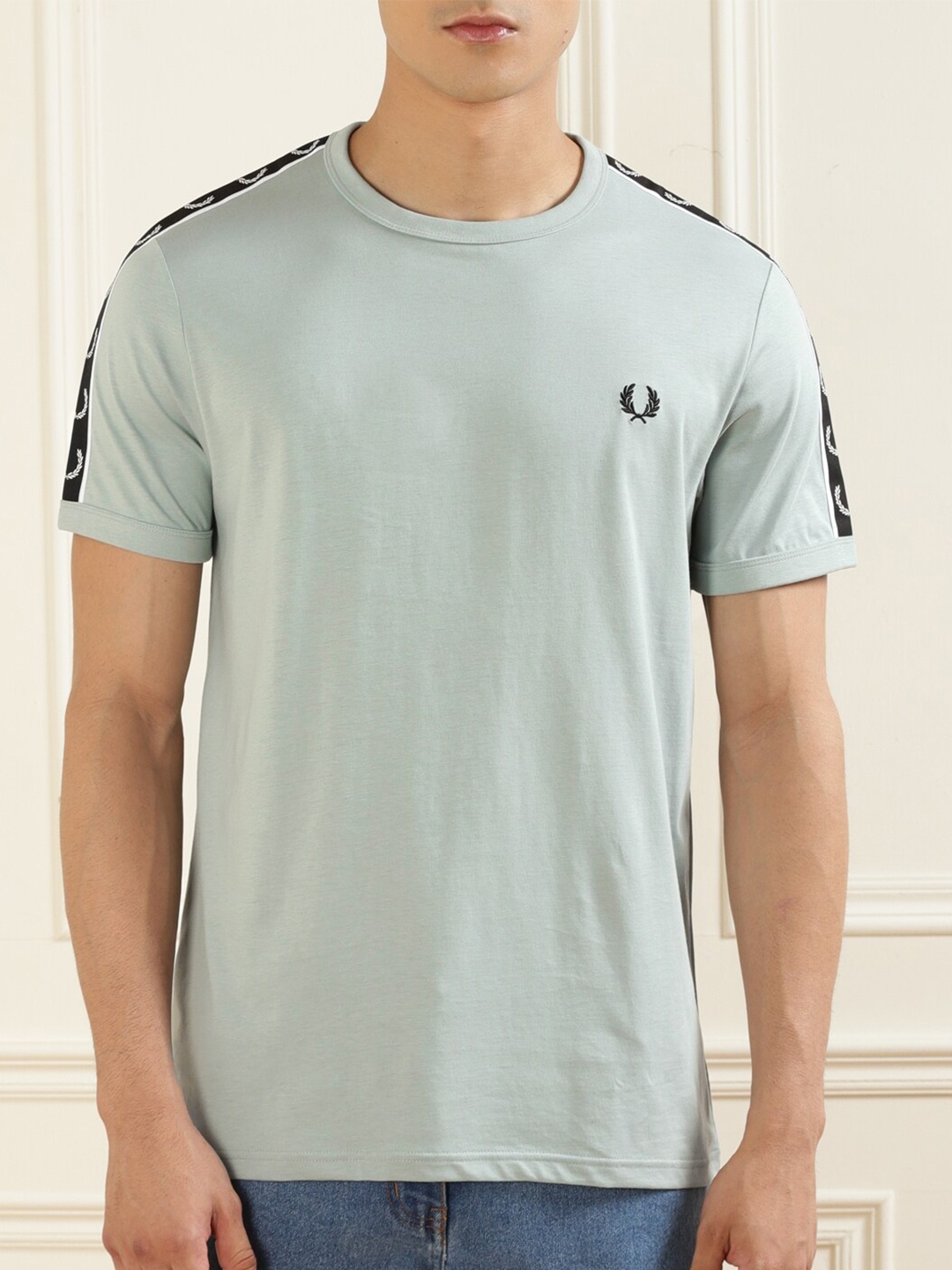 

Fred Perry Men Blue Solid Cotton T-shirt