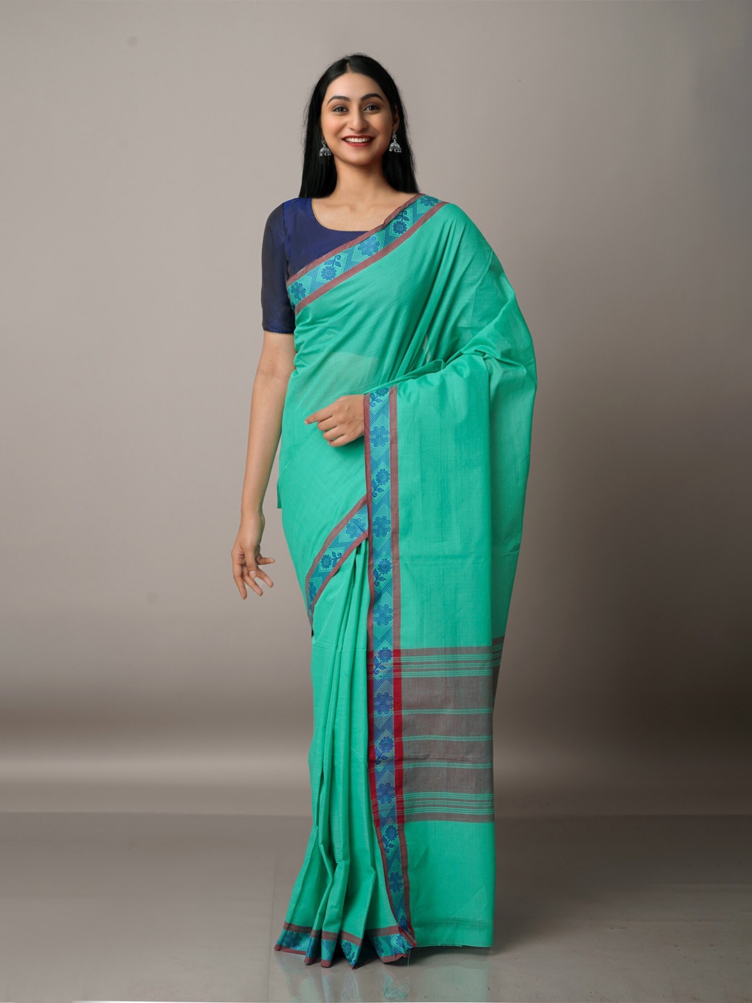 

Unnati Silks Green & Blue Pure Cotton Venkatgiri Saree