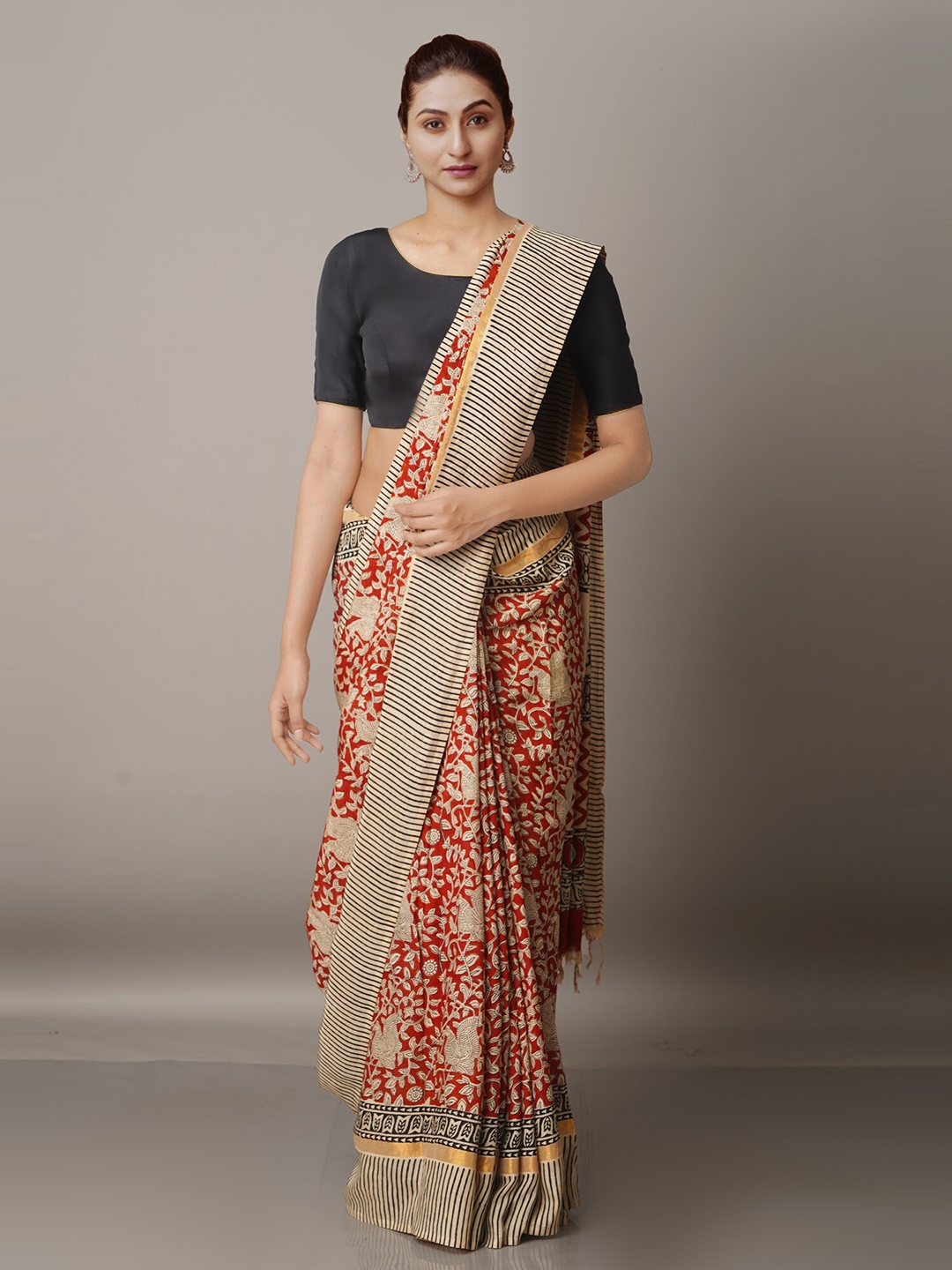 

Unnati Silks Maroon & Black Floral Zari Silk Blend Bagru Saree