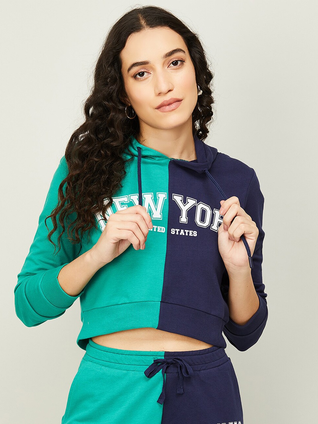 

Ginger by Lifestyle Women Cotton Colourblocked Hooded Sweatshirt, Green