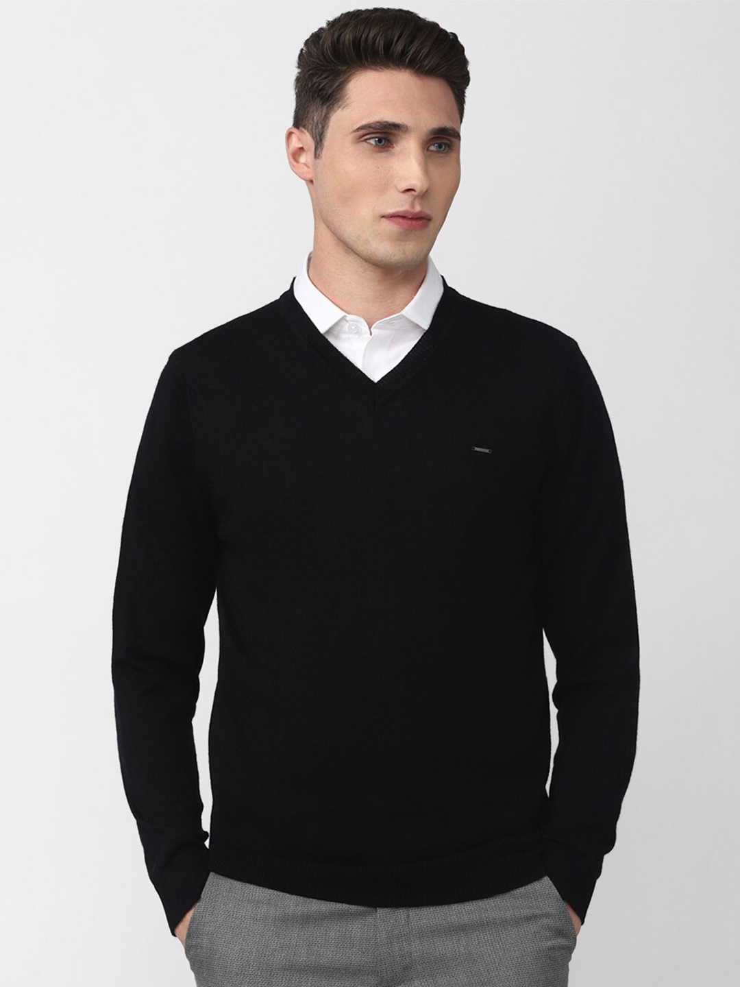 

Van Heusen Men Black Wool Solid Pullover Sweater