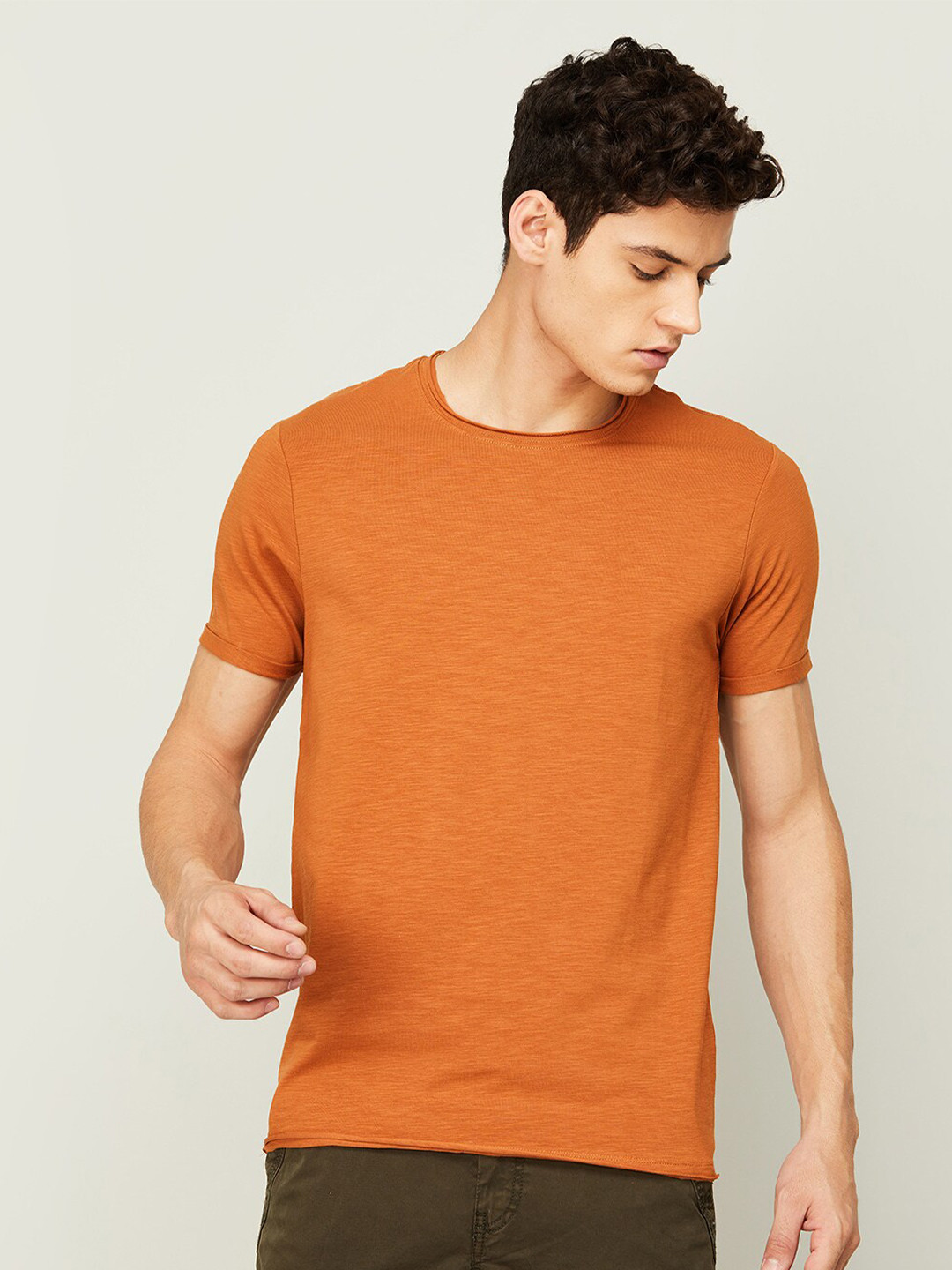 

Forca Men Solid Round Neck Cotton T-shirt, Orange
