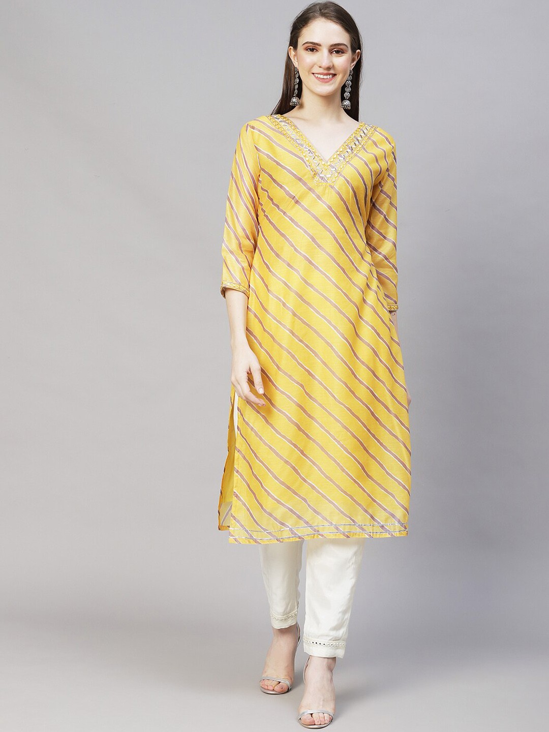 

FASHOR Women Yellow Striped Mirror Work Chanderi Silk Kurta