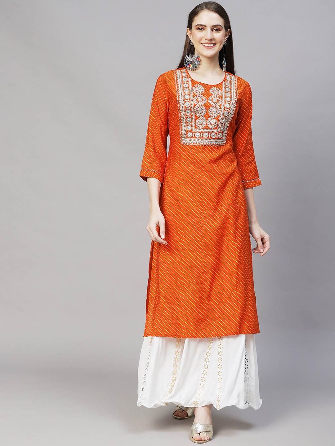 

FASHOR Women Orange Ethnic Motifs Yoke Design Mirror Work Kurta