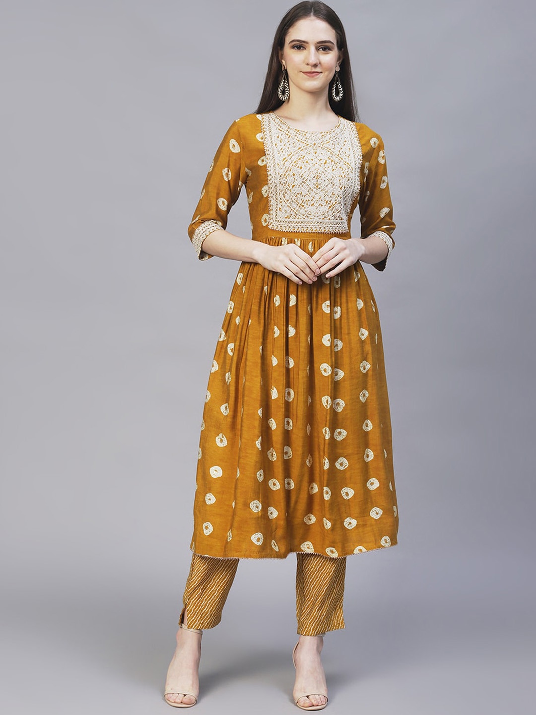 

FASHOR Women Mustard Yellow Ethnic Motifs Embroidered A-Line Kurta with Trousers