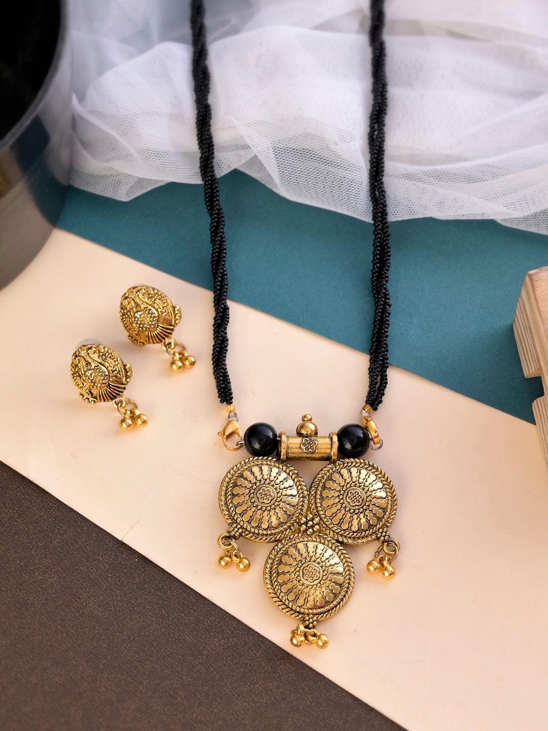 

Shoshaa Gold-Plated Stone-Studded & Beaded Jewellery Set