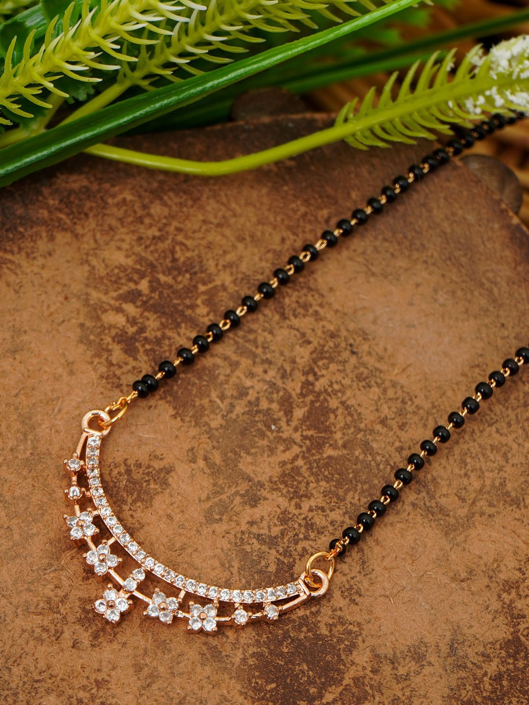 

Urmika Rose Gold-Plated Stone-Studded Beaded Mangalsutra