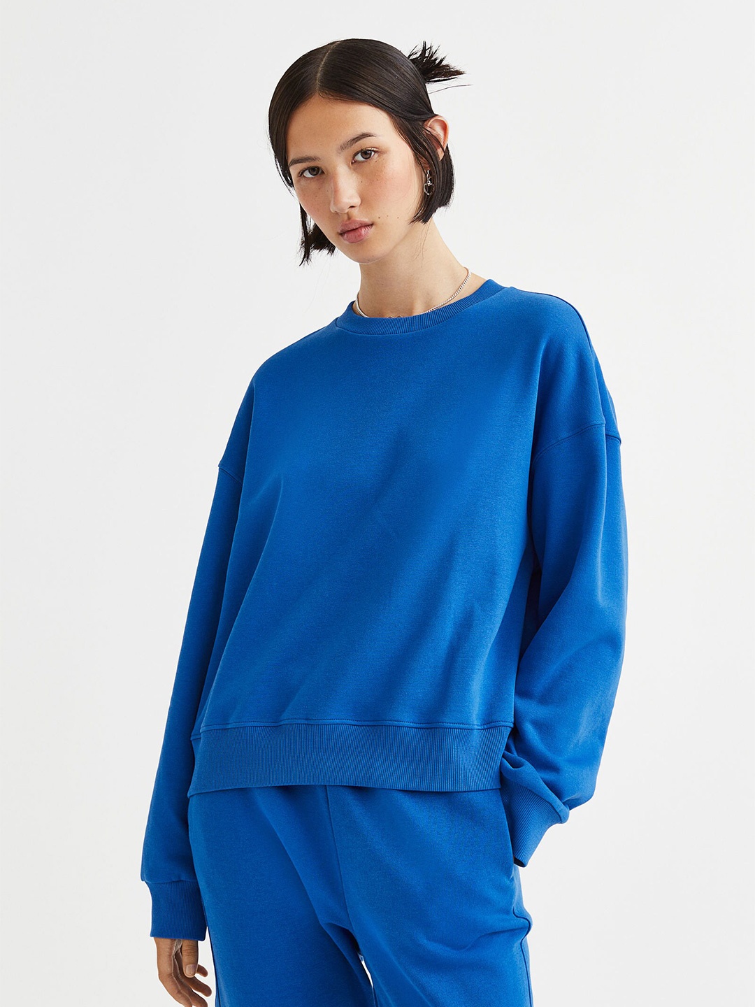 

H&M Blue Solid Knitted Sweatshirt