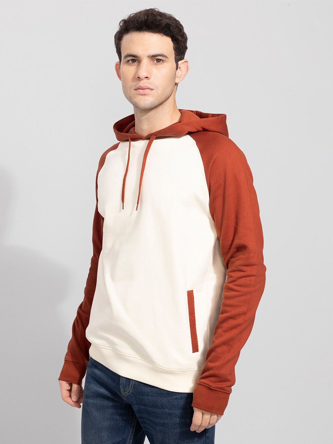 

Snitch Men Solid Hooded Sweatshirt, Cream