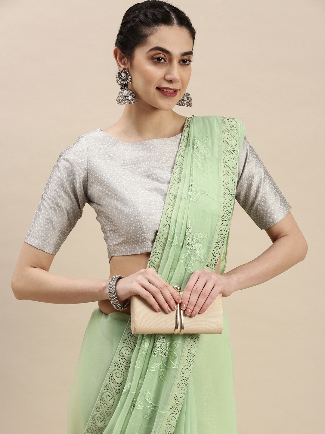 

Pothys Green Ethnic Motifs Sequinned Pure Chiffon Saree