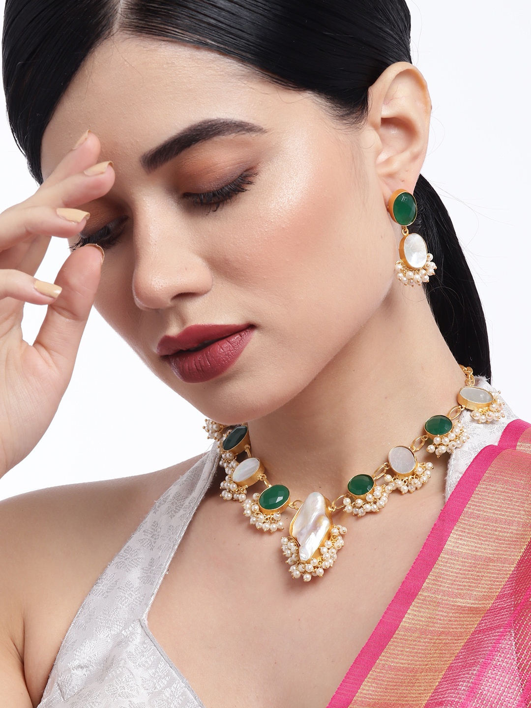 

Golden Peacock Gold-Toned & Green Mother Of Pearls Stones Studded Jewellery Set