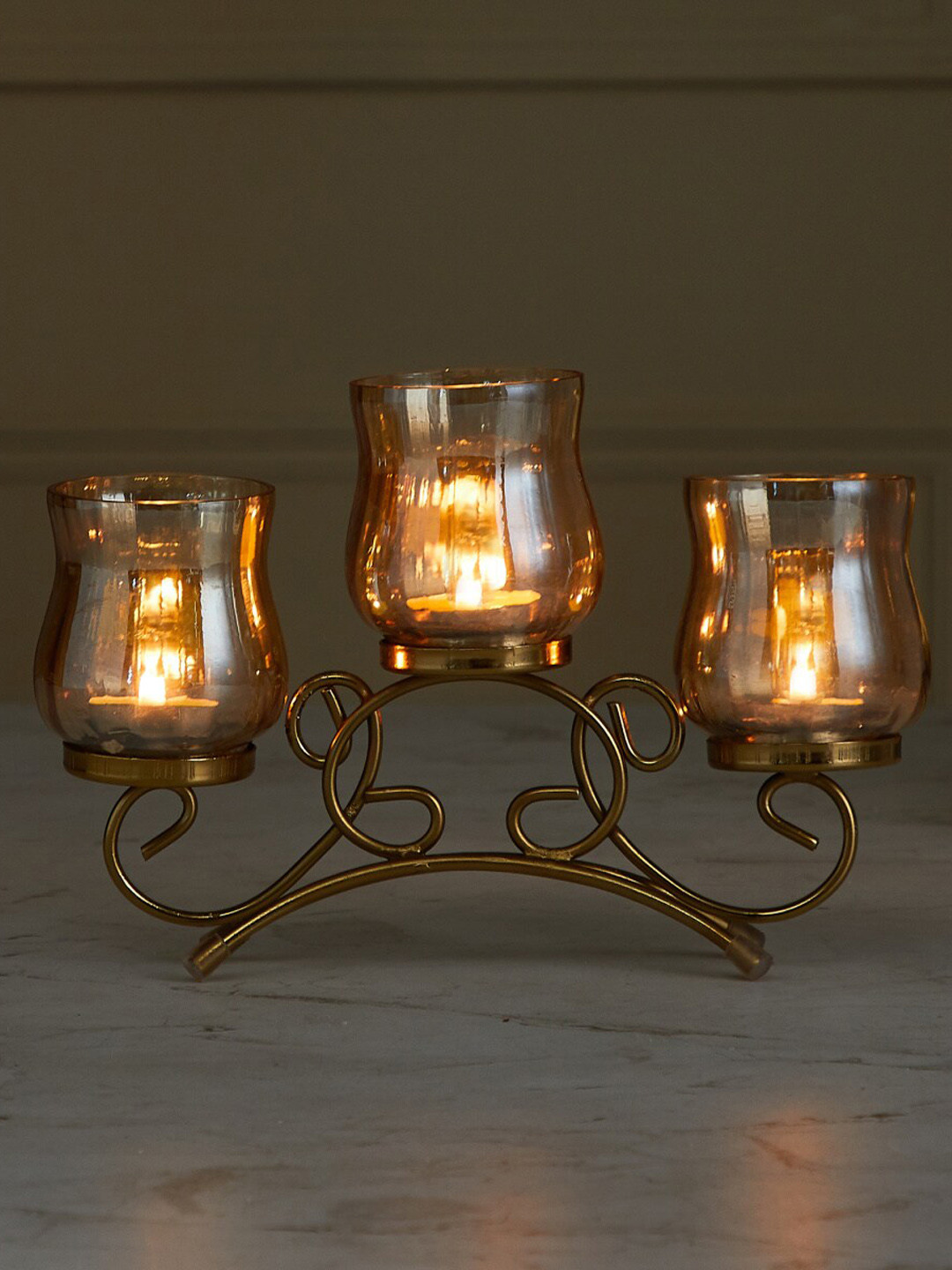 

Home Centre Gold-Toned Glass Candle Holders With Metal Stand