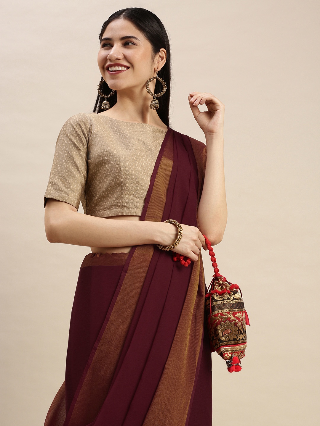 

Pothys Maroon Pure Chiffon Solid Saree