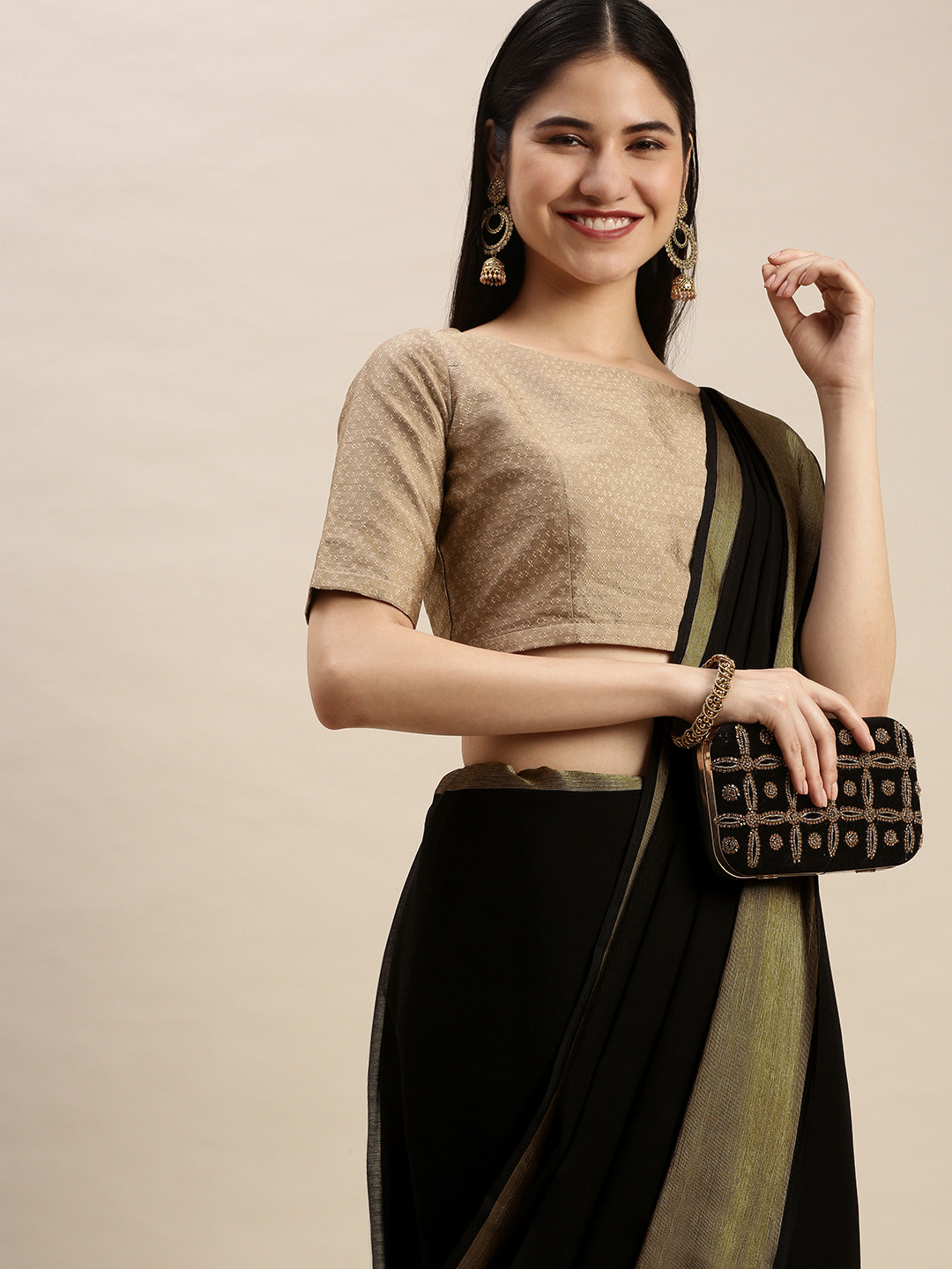 

Pothys Black Pure Chiffon Solid Saree