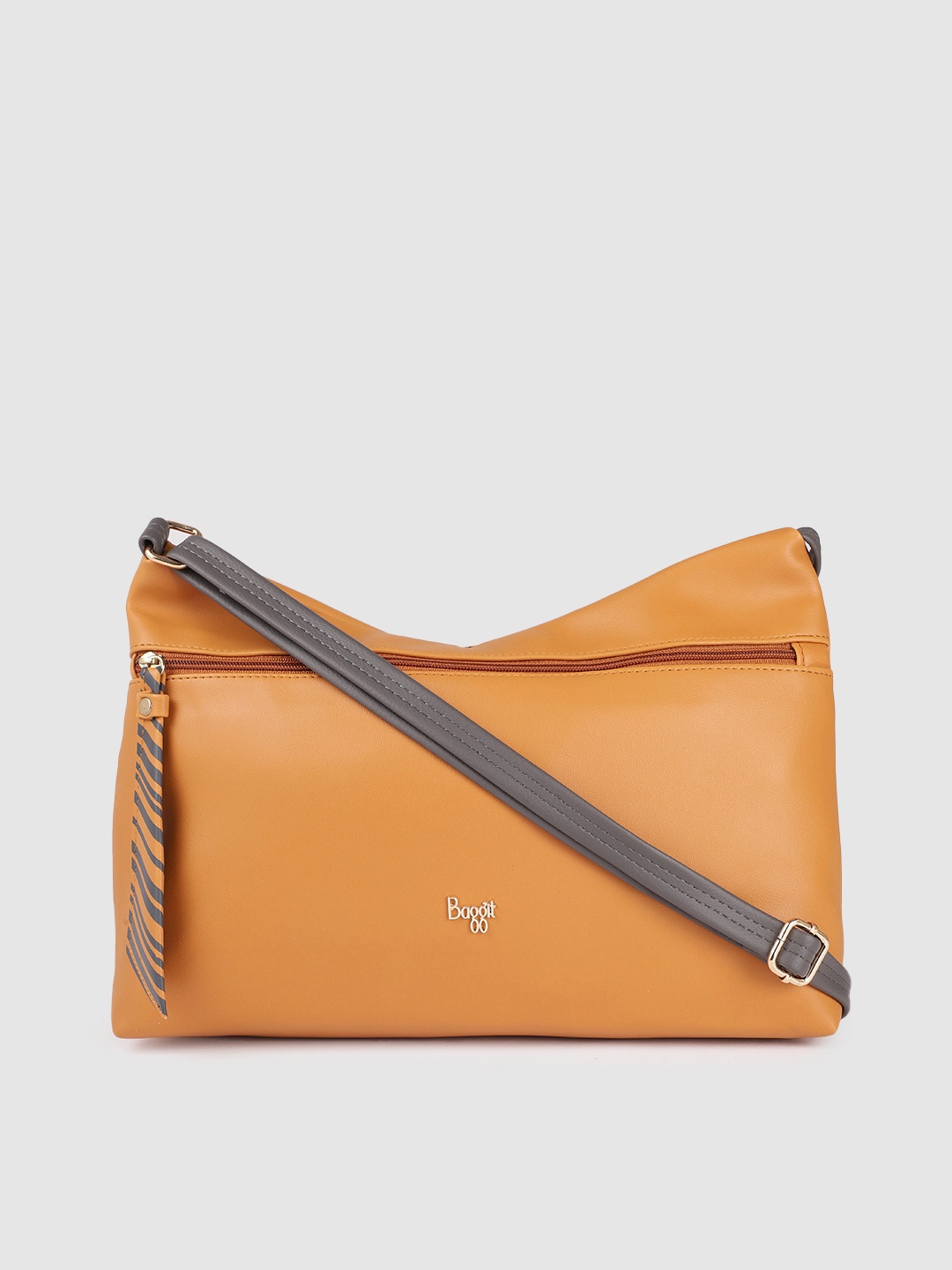 

Baggit Women Mustard Solid Structured Sling Bag