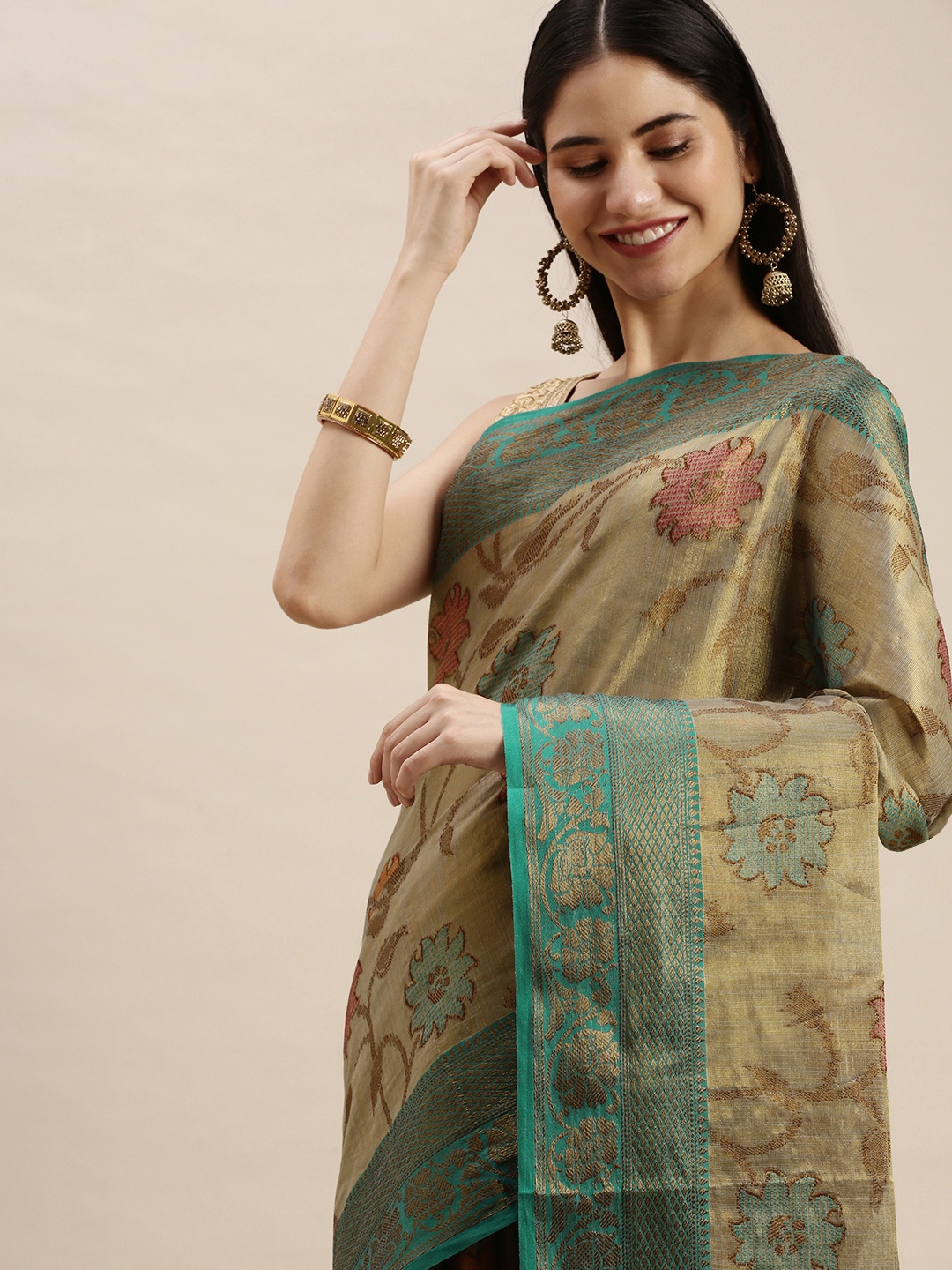 

Pothys Green & Taupe Ethnic Motifs Jute Silk Saree