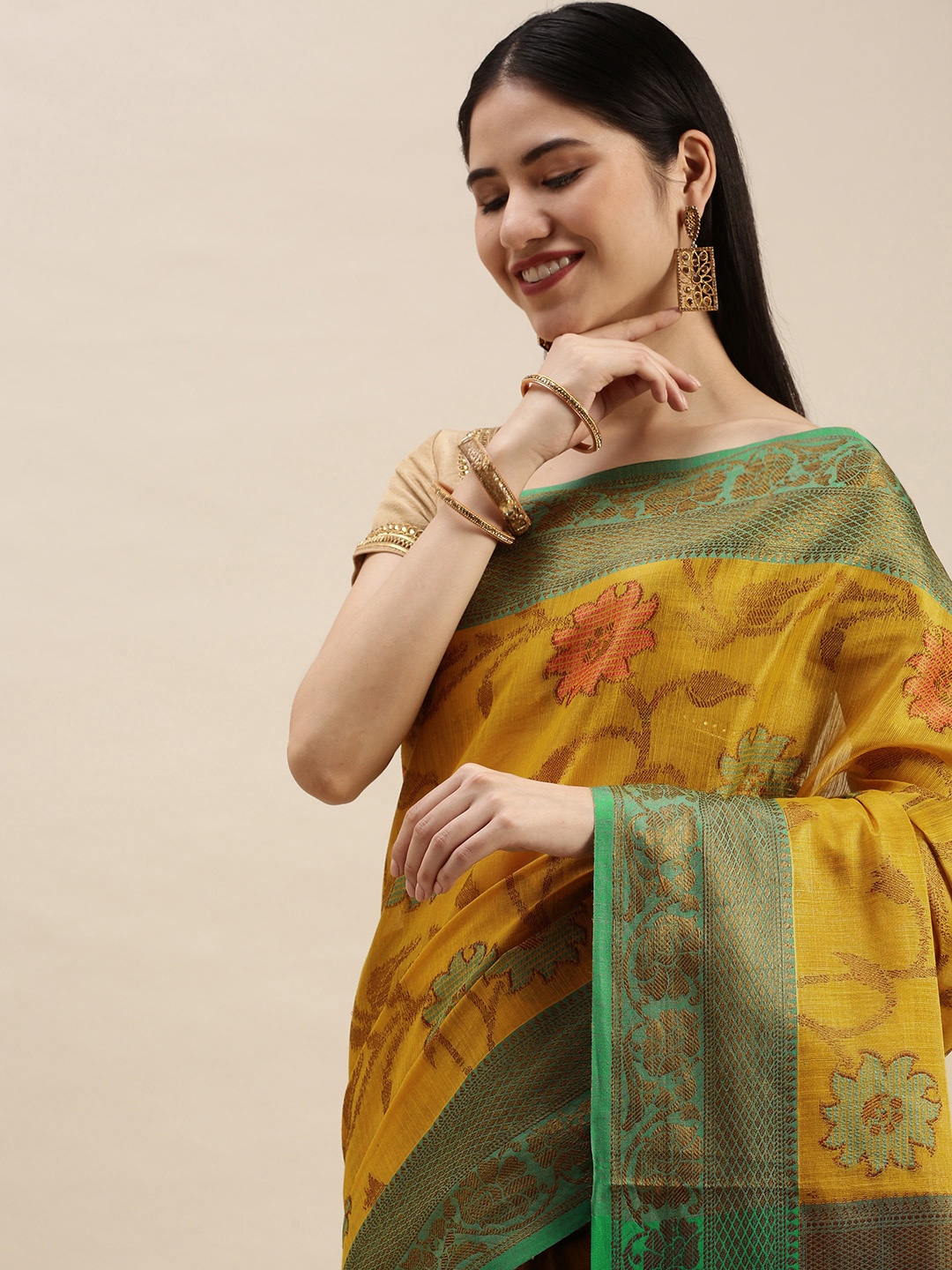 

Pothys Yellow & Green Ethnic Motifs Jute Silk Saree