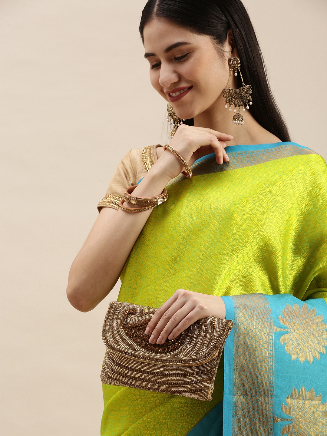 

Pothys Green & Blue Ethnic Motifs Jute Silk Saree