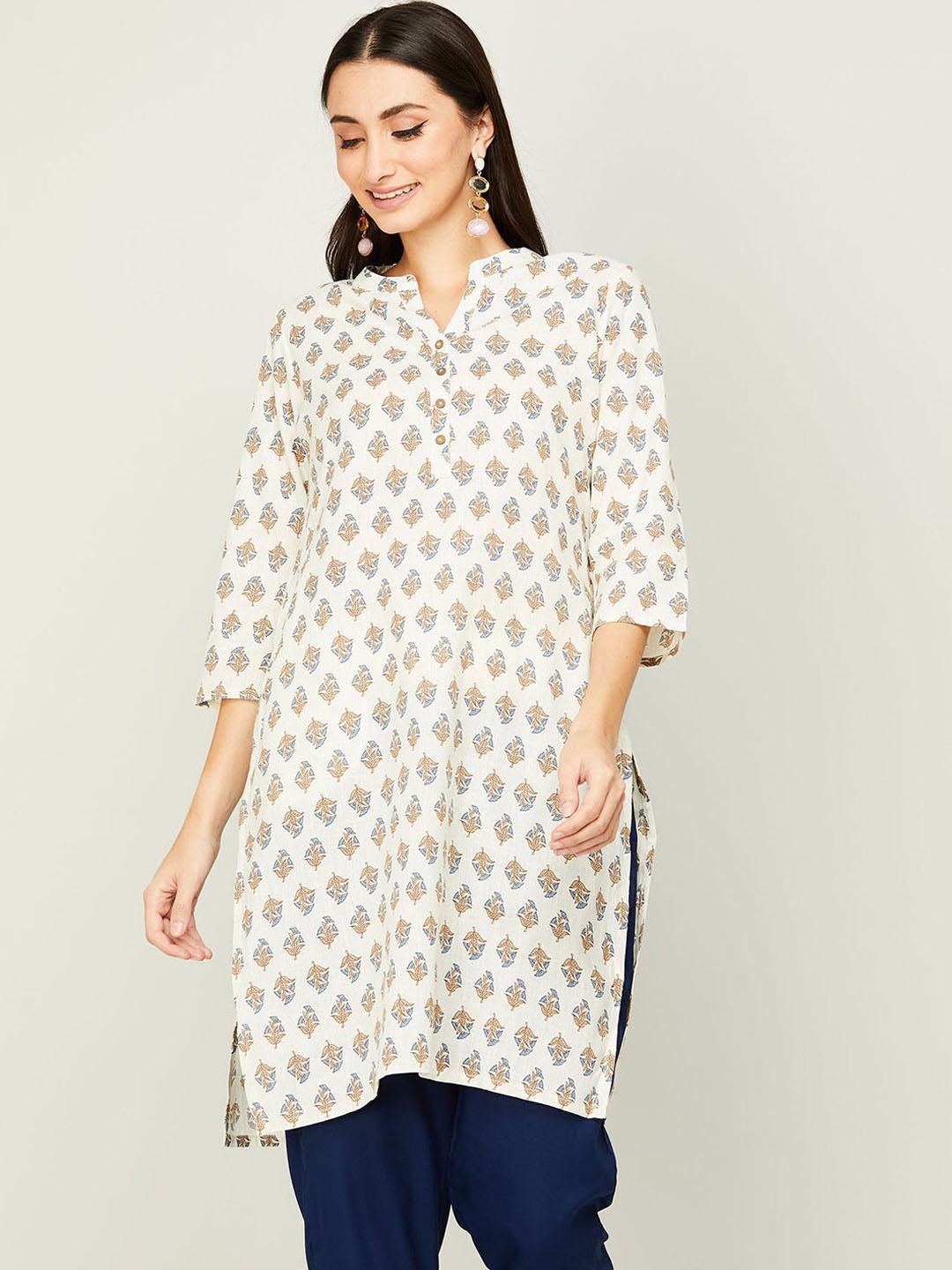 

Melange by Lifestyle Women White Ethnic Motifs Printed Flared Sleeves Mirror Work Kurta