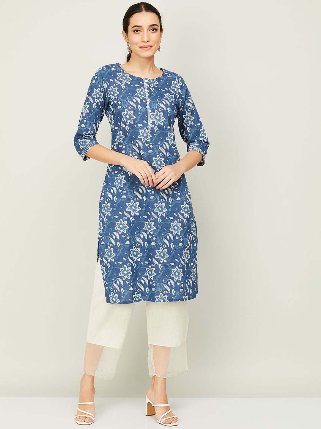 

Melange by Lifestyle Women Blue Ethnic Motifs Printed Keyhole Neck Thread Work Kurta